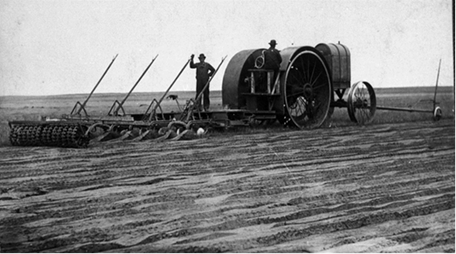 Figure 11.12 Seeding preparation near McCleod, ND, early 1900’s. Soil is plowed, then disked several times to produce a fine powder of soil in which to seed. Any wind will move this soil offsite. (North Dakota State Historical Society, item ND Coll 32 RE/21-5)